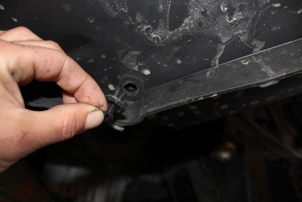 20) Using the same automotive trim removal tool,