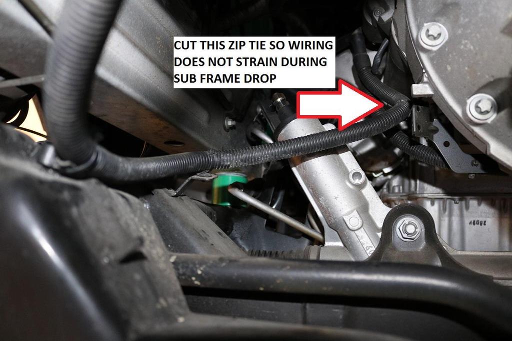 42) Cut the zip tie near the transmission bell housing as the wiring can become strained during