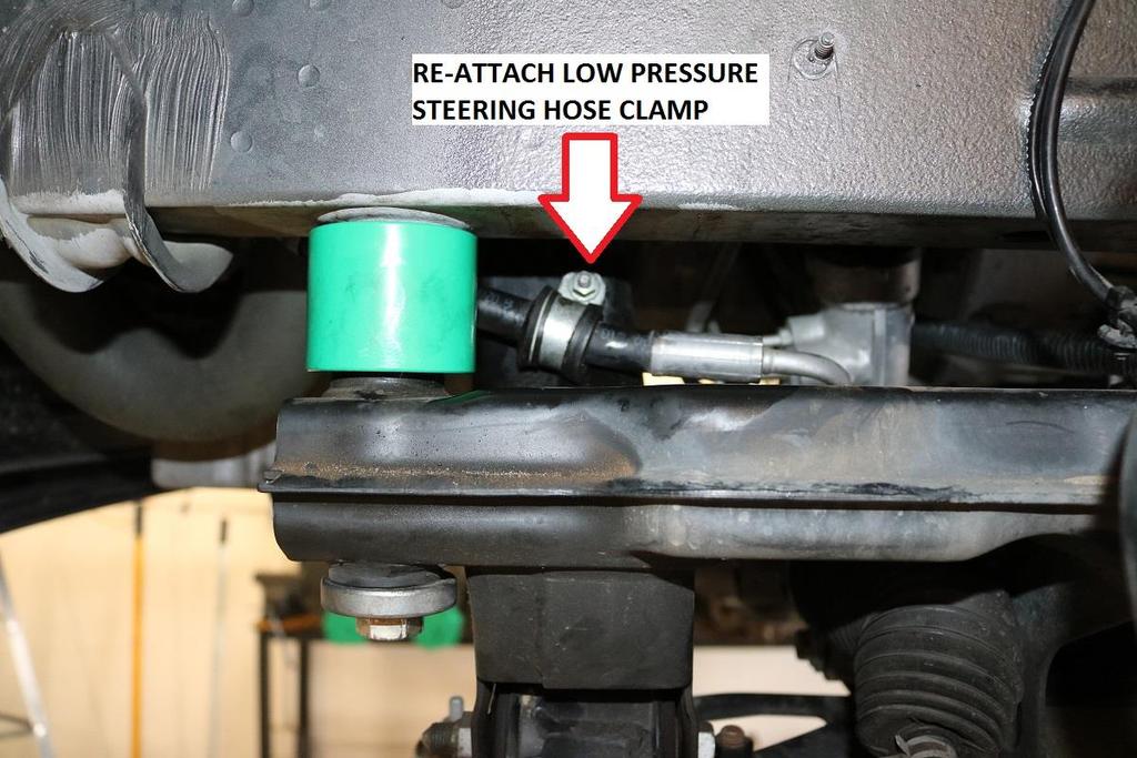 m) 60) At this time, separate the clamp securing the low pressure and high pressure power steering hoses together. This is the clamp / bolt from step 34.