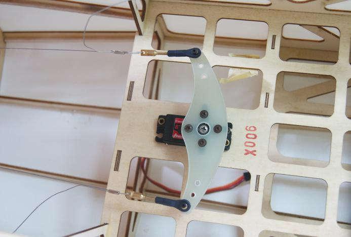 Connect the push rod wire to the servo arm.