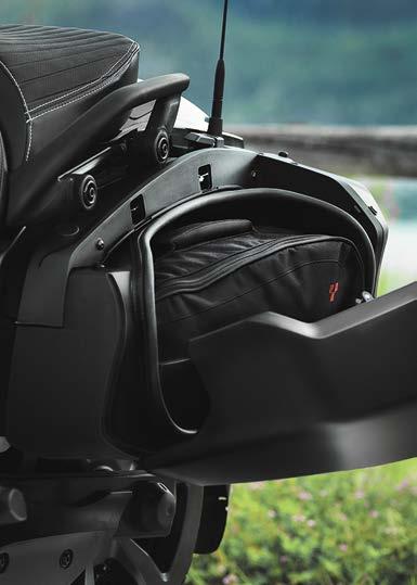 The plushed self-levelling rear air suspension ensures optimal comfort, and the removable top case with