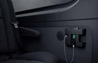 The luxury interior trim with USB charging facility and smartphone holder lends the passenger