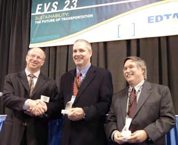2006 Three of the IA-HEV clean vehicle award winners, from left to right: Hans Tholstrup, Australia: Personal award.