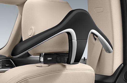 It also features an integrated cupholder with a chrome ring.