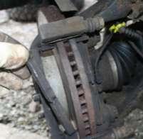 Then do the same for the top bolt, although after loosening the bolt, swing