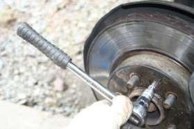 6. How to change the Brake Disks Front Follow the instructions in section 2 to remove the brake pads.