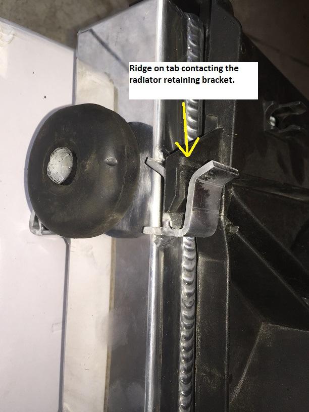 As you may have noticed from the previous picture, the tab does not slide all the way into the retaining bracket. This due to the location of the bracket.