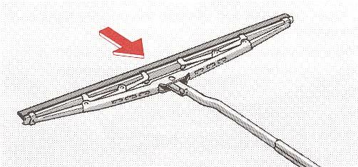 3. Press on the lock pin at the rear side where the wiper arm and blade connect, and slide