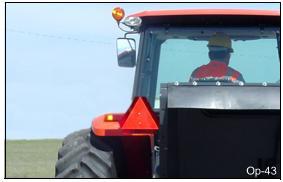 OPERATION 12. Transporting the Tractor and Implement Inherent hazards of operating the Tractor and Implement and the possibility of accidents are not left behind when you finish working in an area.