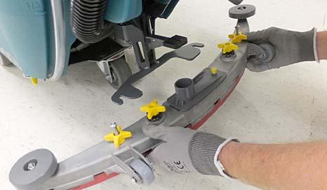 Lift the squeegee mount bracket to the raised position. Place toe under pedal to lift (Figure 5).