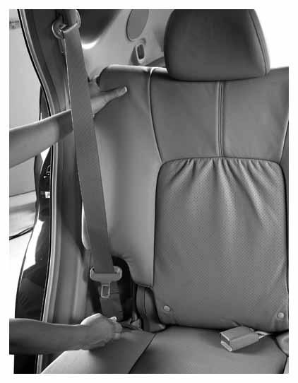 To exit the rear seat from the driver s side, pull the strap 03 behind the driver s seat to release the driver s seatback.