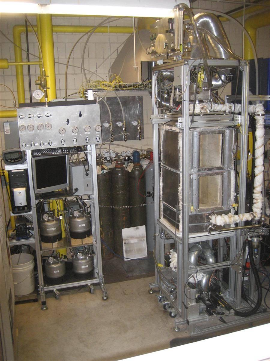Experimental Set-Up Simulated Oil Heating Furnace Heating Capacity up to 40 kw Equipped with Thermocouple & Pressure Transducers. Custom Built Swirl-plate Stabilizer. Easily Movable fuel nozzle.