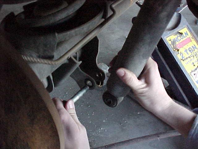 Now that the coil springs are installed go ahead and install your lifted front shocks( not supplied.
