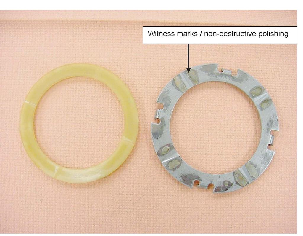 Thrust washers can be made of a metal or plastic type material. They will almost always have lube grooves designed into the contact surface of the washer to provide a "puddle and smear" action.