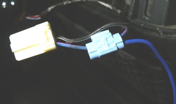 This is easier than removing the entire dash piece. The blue wire with pink stripe is the wire you want to splice into for the Remote Amp Wire.