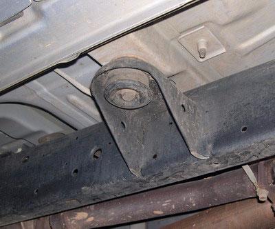 Loosen, but DO NOT remove, remaining cab mounting bolts on