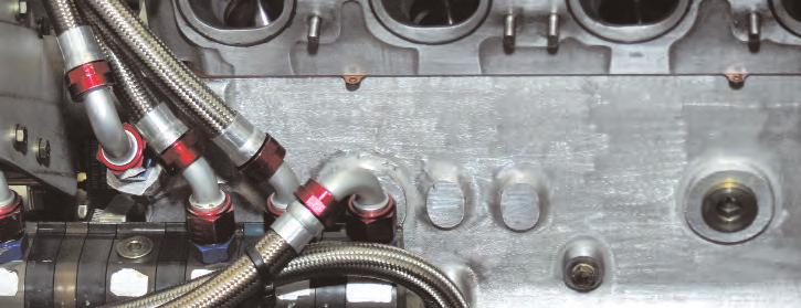 This five-stage oil pump (four scavenge, one pressure) has fine mesh screens embedded in the fittings at the ends of the number 12 lines to minimize the risk of particles entering the pump.