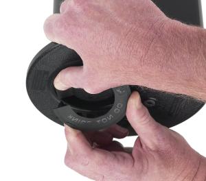 Lay the snap-ring on top of the rotor and use the left thumb to force the left open end of the snap-ring into the upper snapring groove within the body (FIGURE 66).