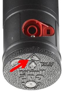 On the G70 s rubberized logo cap, locate the two opposing arrowhead shaped areas directly above the nozzles (FIGURE 29).