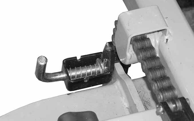 Rear height adjusting chain Locking pins Locking pin - Storage position 60 deck shown Figure
