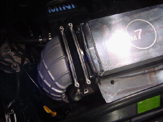 Attach the small silicone boot directly onto the intercooler and clamp it down.