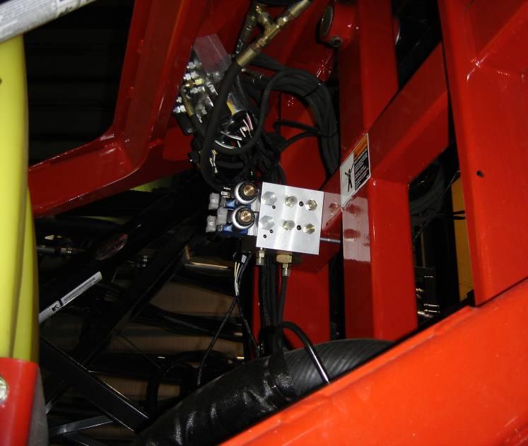 10.2 Valve Block Mounting 1. Mount the valve block on the center section of the boom near the sprayer valve block, as illustrated in Figure 28