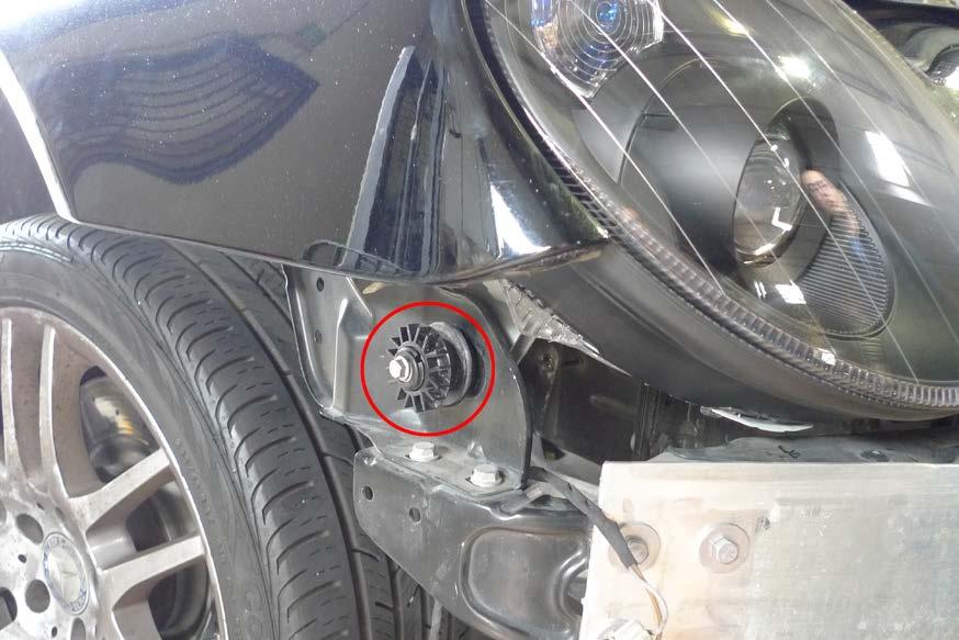 Photo below shows the Gear/Bolt exposed with the bumper removed.