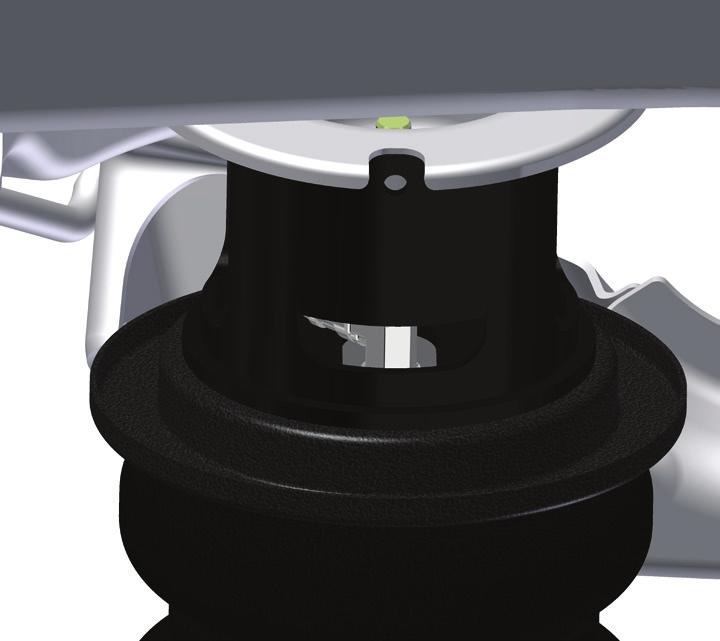 Seat the airspring within the lower control arm/roll plate and align the