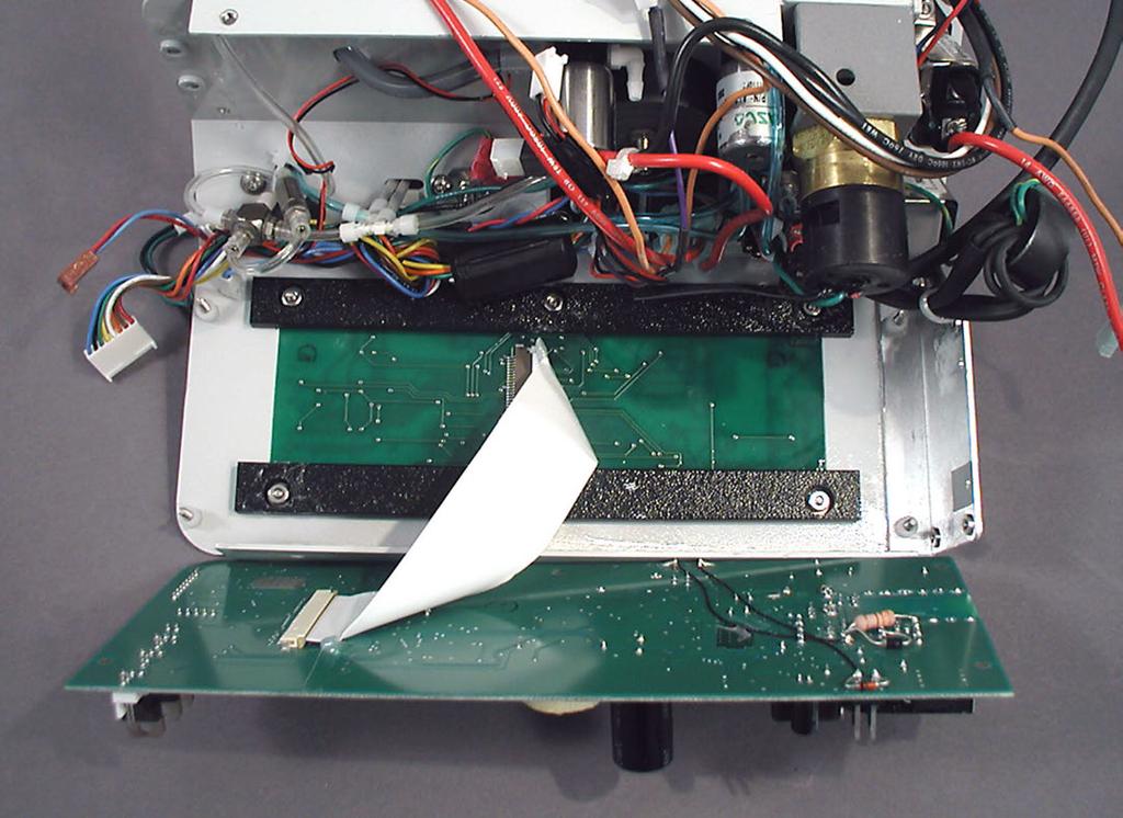 DISPLAY BOARD - Fig. Remove the pump cover as previously described under Power Supply disassembly procedure.