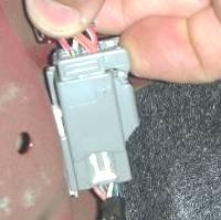 3) Unplug grey taillight