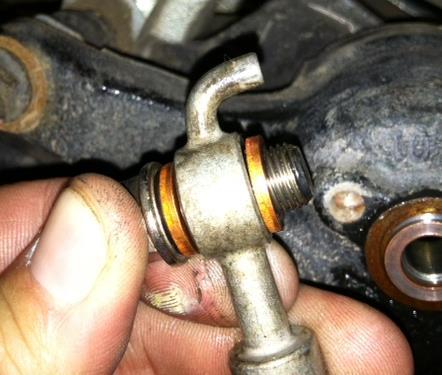INSTALLATION: 1. Disconnect the brake hose at the caliper, discard the copper washers and save the banjo bolt.