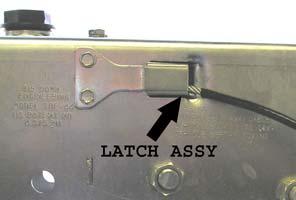 A latch mechanism keeps the lever in the energized mode even if the breakaway chain or cable is ripped away by the separation of the truck and trailer.
