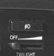 When the Twilight Sentinel lever is on and it s dark enough outside, the high-beam headlamps (at reduced intensity) will turn off and normal low-beam headlamp operation will occur.