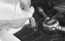 3. Then fill the coolant surge tank with the proper mixture, to the base of the filler neck. 4.