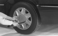 Removing the Wheel Cover Removing the Flat Tire and Installing the Spare Tire There is a