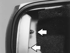 Rear Turn Signal Lamps and Taillamps 1. Open the trunk to gain access to the lamp housing. 2.