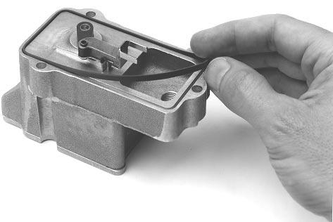 Slightly lift the front portion of the INTEGRATED ACTUATOR COVER as shown in Figure 4. 2.