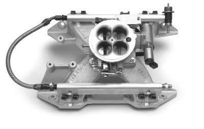 INDUCTION SYSTEM The Edelbrock Pro-Flo system delivers fuel and air to the engine via the induction system consisting primarily of a manifold, 4-barrel air valve, fuel rails,
