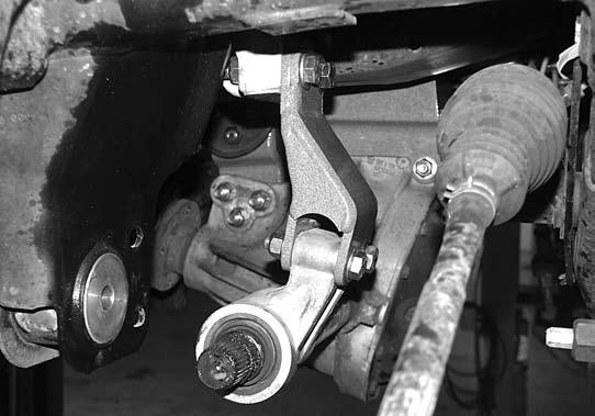 Attach the differential to the driver s side front and rear brackets (Fig 15) with! x 2-1/2 bolts, nuts and washers (BP #617).