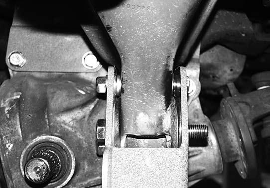 Install the new rear crossmember (01233) to the OE rear lower control arm mounts in conjunction with the aluminum spacers that were