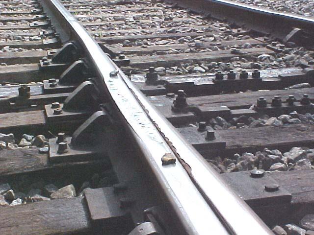 The length and location of a transition zone is affected by three factors: switch point length, switch point and stock rail wear and wheel tread profile.