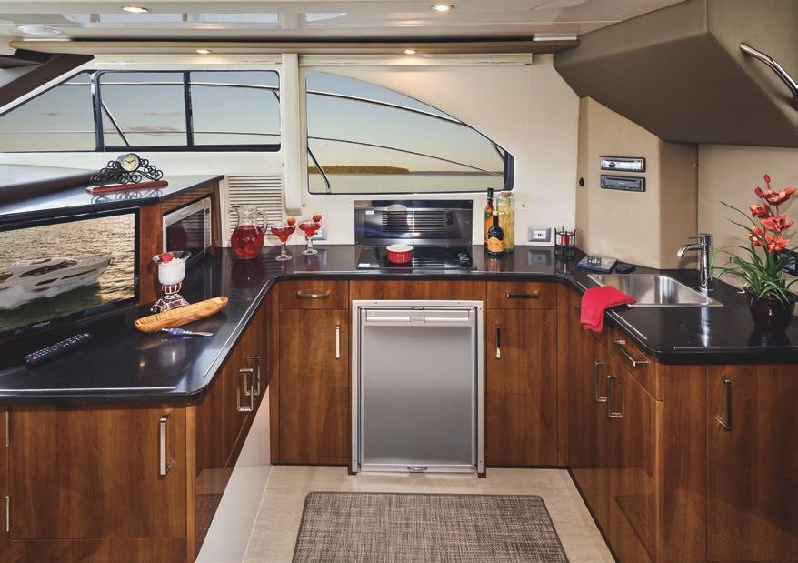 The bridge deck also incorporates gracious wrap-around seating with an available table, ample under-seat storage, and an aft sun lounge for enjoying lazy summer afternoons.