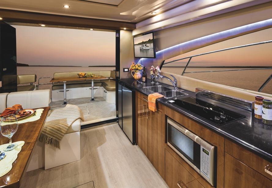 To enhance onboard entertaining, a cockpit table, icemaker and refrigerator are also available.