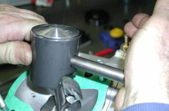 (SCREWDRIVER WITH ROUNDED EDGE) PAY ATTENTION NOT TO SCRATCH THE PISTON AND CIRCLIPS SEAT. - REMOVE PISTON PIN BY USING THE SPECIAL PISTON PIN PUNCH TOOL (P.N. 10200) (see Fig.42).