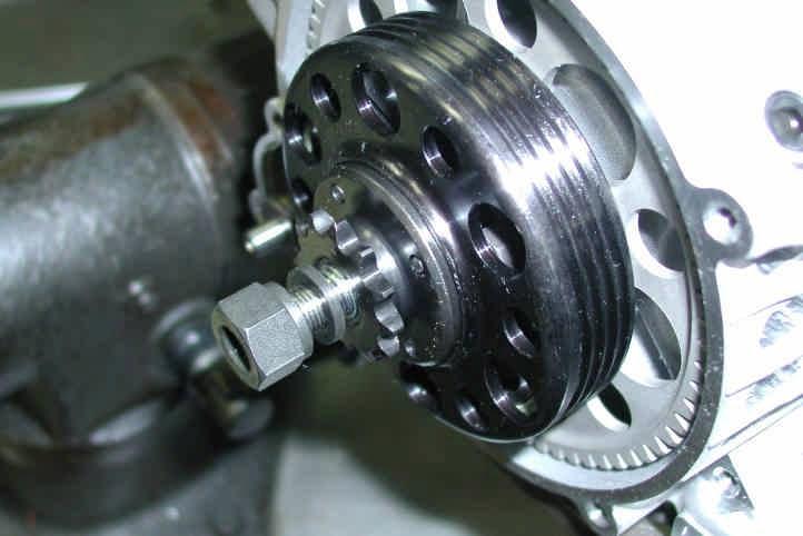 - INSTALL CLUTCH DRUM, OUTER WASHER AND M10 NUT (see Fig.46). Fig.46 INSTALL WASHER WITH BEVEL TOWARDS CRANKSHAFT - APPLY LOCTITE 243 ON THREADS AND TIGHTEN THE M10 CLUTCH DRUM RETAINI NG NUT (see Fig.