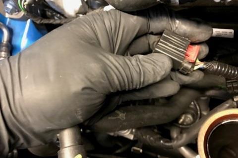 5 To disconnect the PCV tube from the intake manifold simply squeeze each side of the connector fitting and
