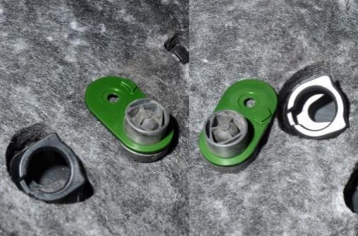 Locate the small green brackets included in the kit and install the rubber mounts into the large holes.