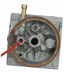 6. Clean the float valve seat using carburetor cleaner and compressed air. FLOAT VALVE SEAT 7.