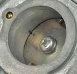 If it does not flow around the pilot screw tip, remove the pilot screw and clean the passage The pilot screw must be destroyed and replaced if it is