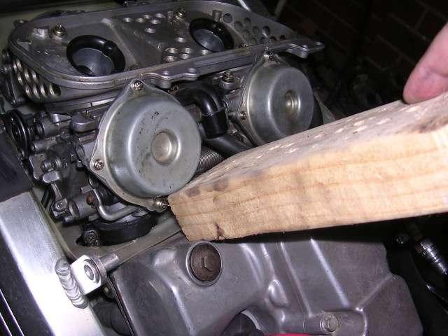 ) to use a piece of wood against the rocker cover, gently levering them off via the left rear